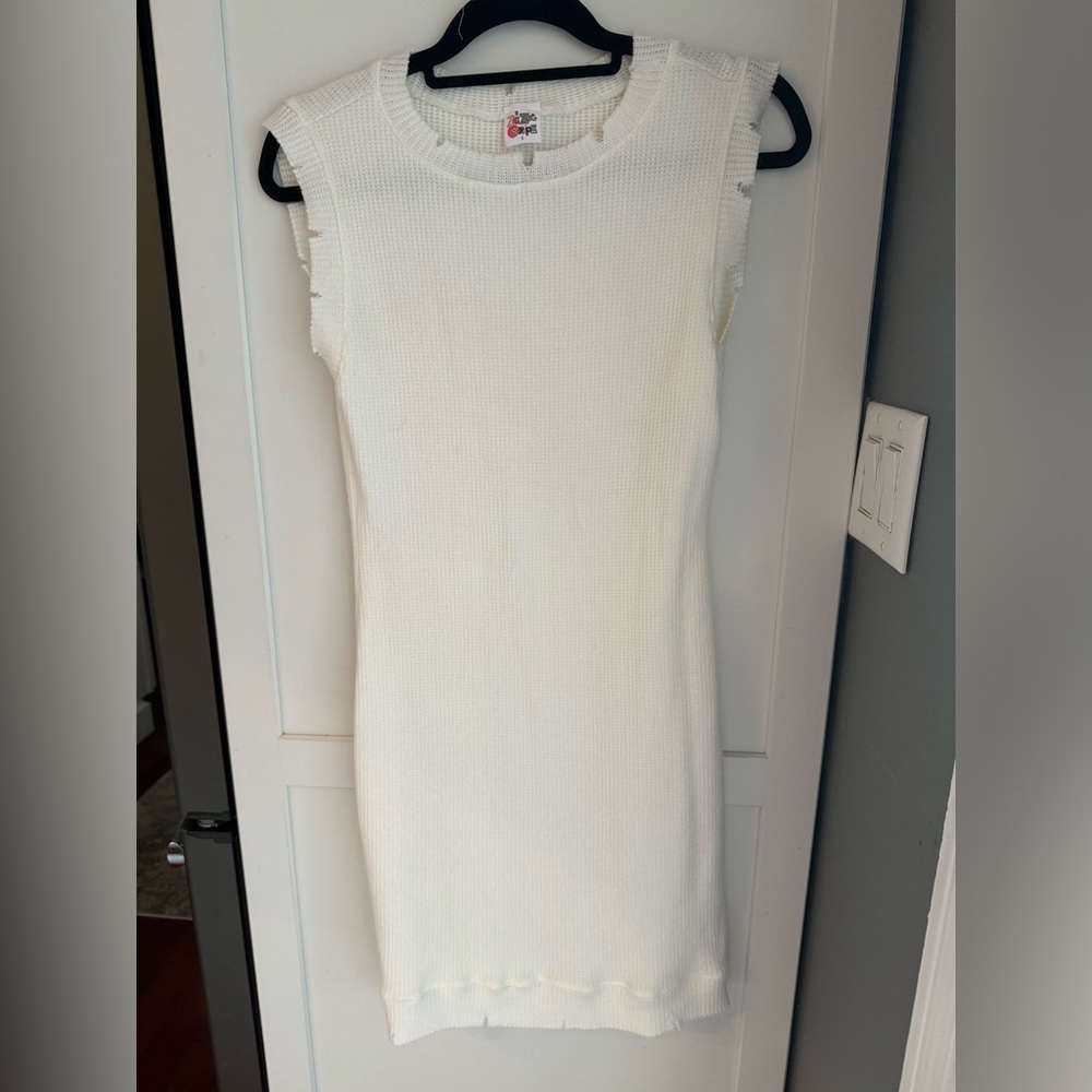 NWOT White Knit Dress. Distressed/frayed neckline and hem. Sleeveless